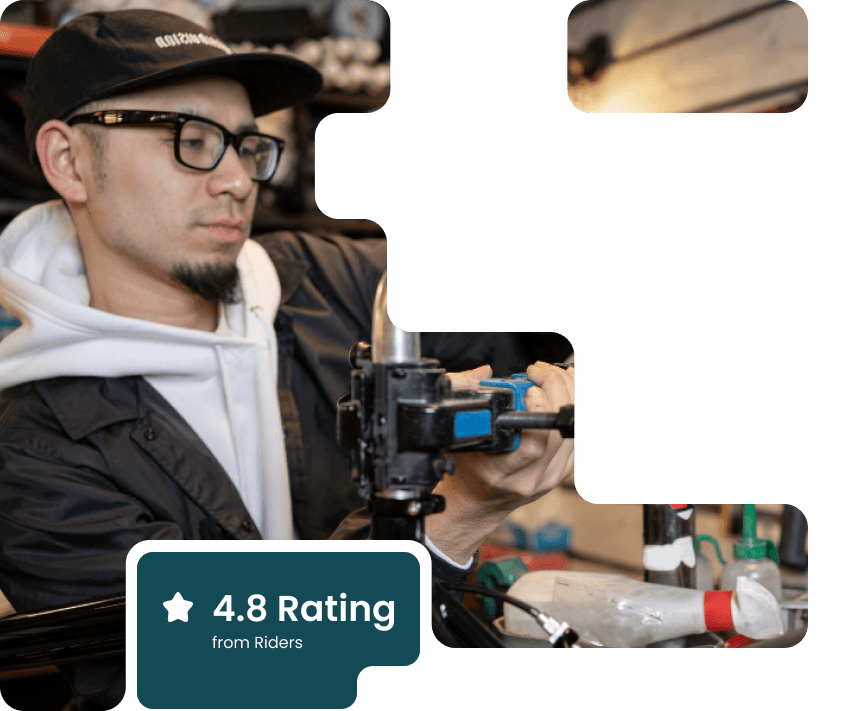 Mechanic servicing a mountain bike