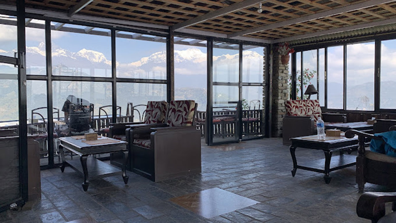 View of Annapurna range seen from the windows of Stupa's Elite Cafe.