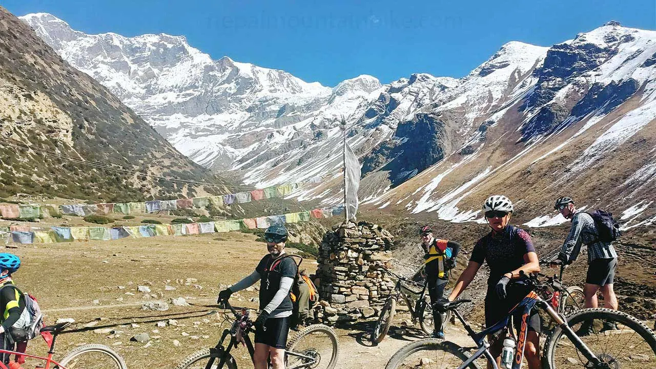 Mountain bikers taking rest during their Annapurna Circuit MTB tour.
