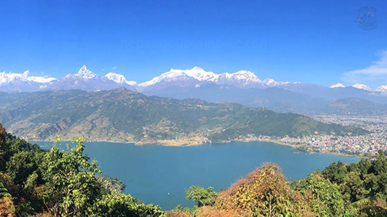 Annapurna Himalayan range and Fewa Lake spotted during round the Fewa Lake mountain bike tour in Pokhara.
