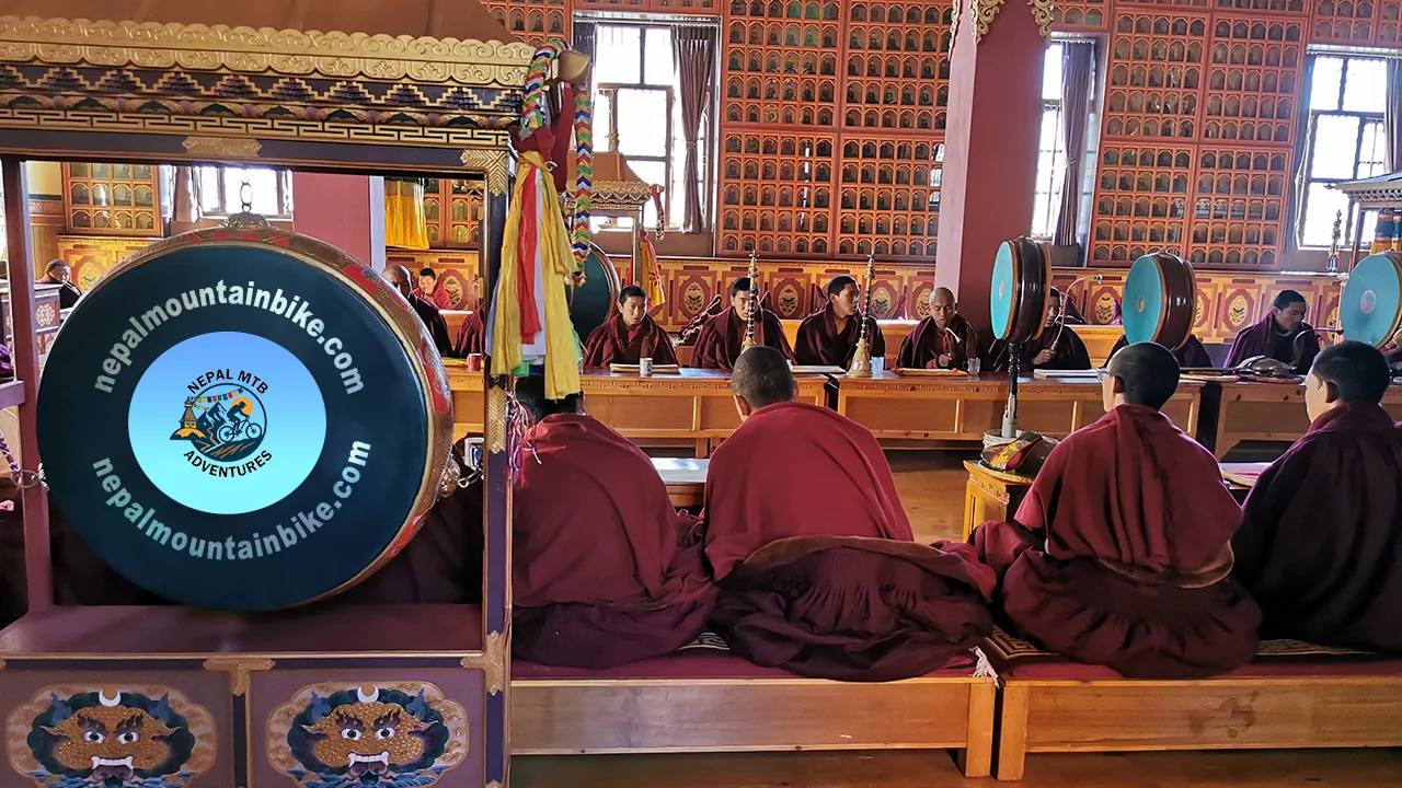 Monks inside a monastery captured performing their rituals during Mustang mountain bike tour in Nepal.